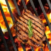 grilled pork steak on the flaming grill 2021 08 26 20 10 07 utc scaled